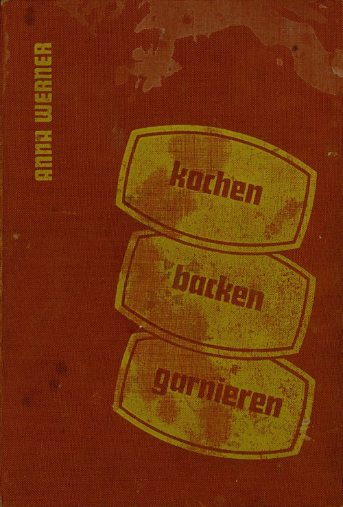 Abgebildet ist der einfach gestaltete Einband des Buches „Kochen, Backen, Garnieren".