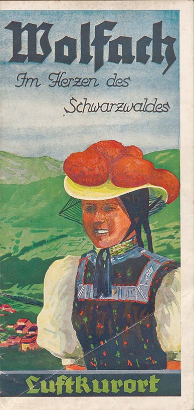 Cover der Broschüre über Wolfach mit Dame im traditionellen Bommelhut