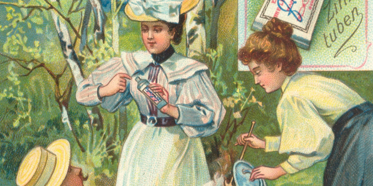 Der bunte Detailausschnitt eines Sammelbildes zeigt eine Picknickszene. Zwei Frauen bereiten mit einer Fleischextrakt-Paste aus der Tube eine Suppe vor. Ein Mann schaut dabei zu.