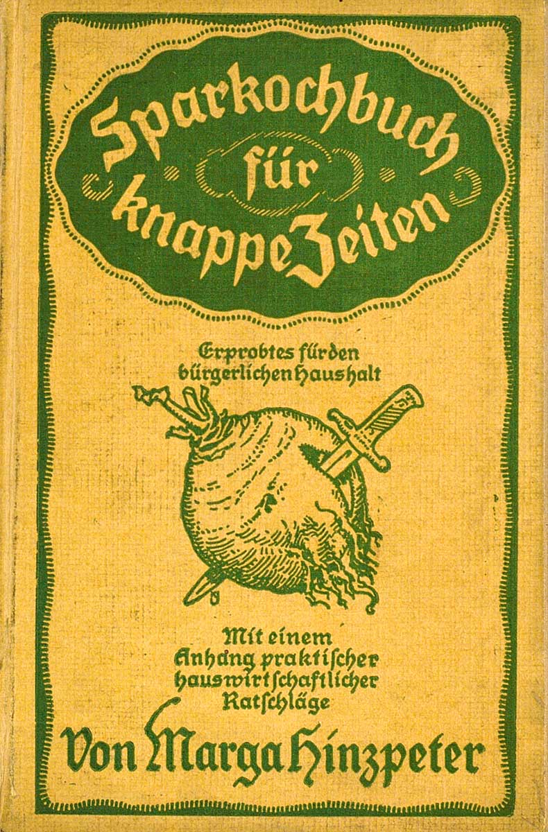 © Badische Landesbibliothek Karlsruhe Gelber Buchdeckel mit grüner Schrift und Illustration einer Sellerknolle die mit einem Messer durchstochen ist.