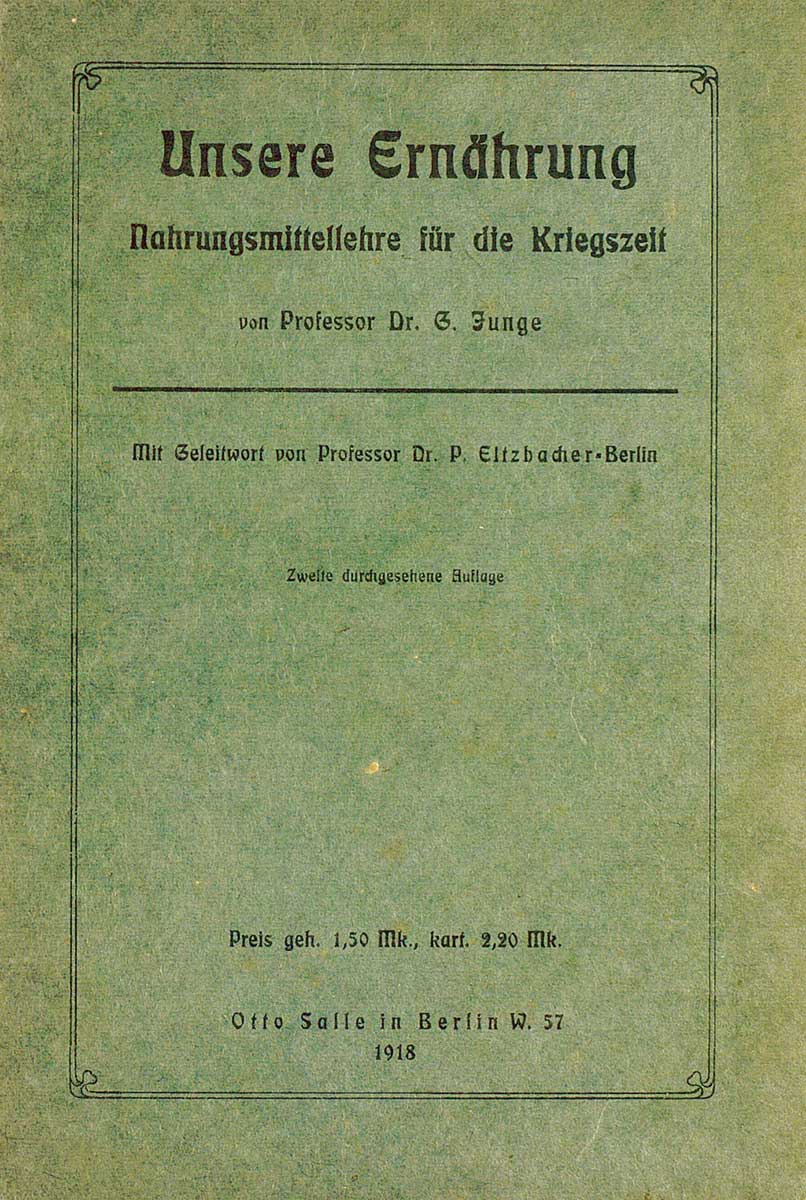 Grüner abgenutzter Buchdeckel von Gustav Junge's "Unsere Ernährung. Eine Nahrungsmittellehre für die Kriegszeit. Für Schule und Haus."