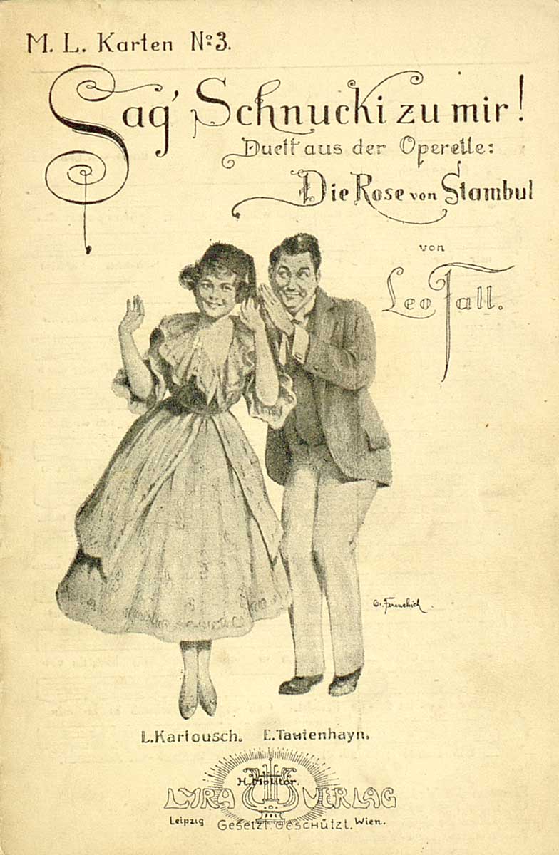 © Badische Landesbibliothek Karlsruhe Zu sehen ist die Vorderseite einer Postkarte zur Operette "Die Rose von Stambul" mit der Sängerin Louise Kartousch und dem Sänger Ernst Tautenhayn im Duett.dchens mit reich geschmücktem Stirnband und Zierfeder