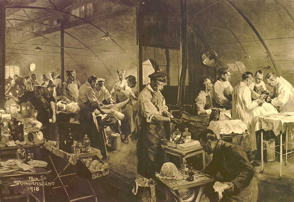 © Badische Landesbibliothek Karlsruhe Zu sehen ist der Operationssaal eines Feldlazaretts. Es herrscht reges Treiben. Abgebildet sind etwa 22 Personen. Einige davon Ärzte samt Helfern die Patienten operieren. Überall lassen sich zudem medizinische Flaschen unterschiedlicher Natur erkennen.