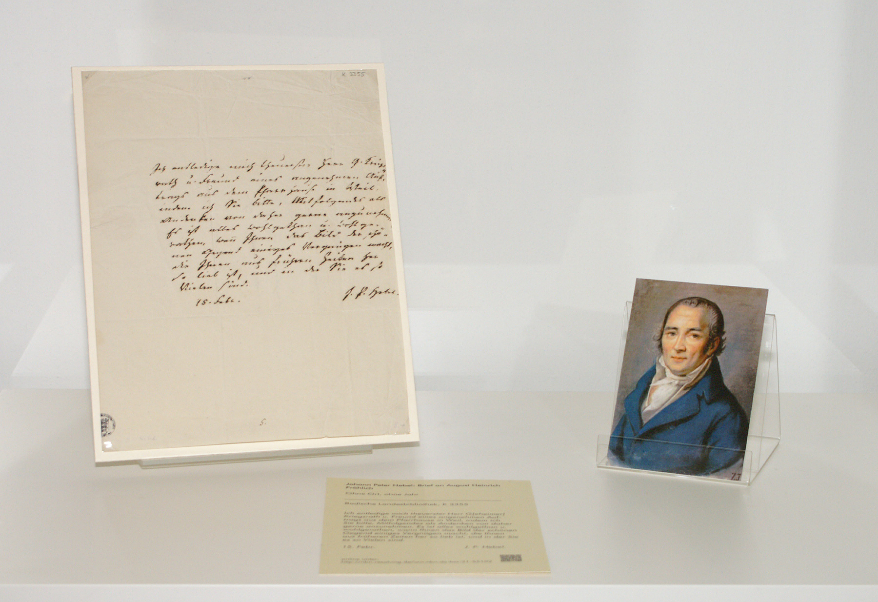 Undatierter Brief von Johann Peter Hebel an August Heinrich Fröhlich. Ebenfalls zu sehen ist ein farbiges Porträt von Hebel.